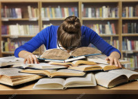 depositphotos_106801130-stock-photo-student-studying-sleeping-on-books.jpg